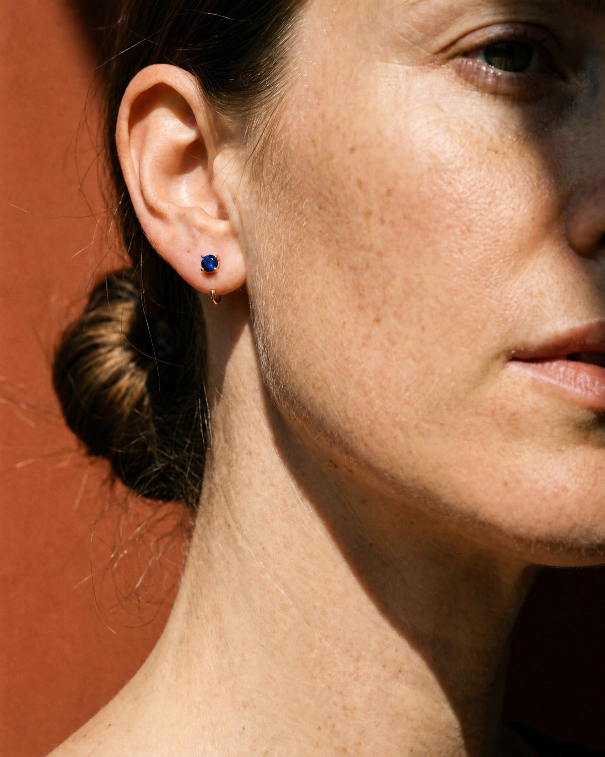 Blue Round Open Hoop in 18K Gold Vermeil, worn on the ear