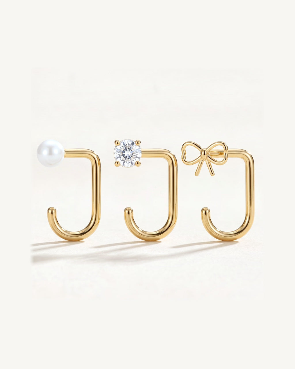 Bow, Clear Round and White Bead, 18K Gold Vermeil, the three pieces side by side