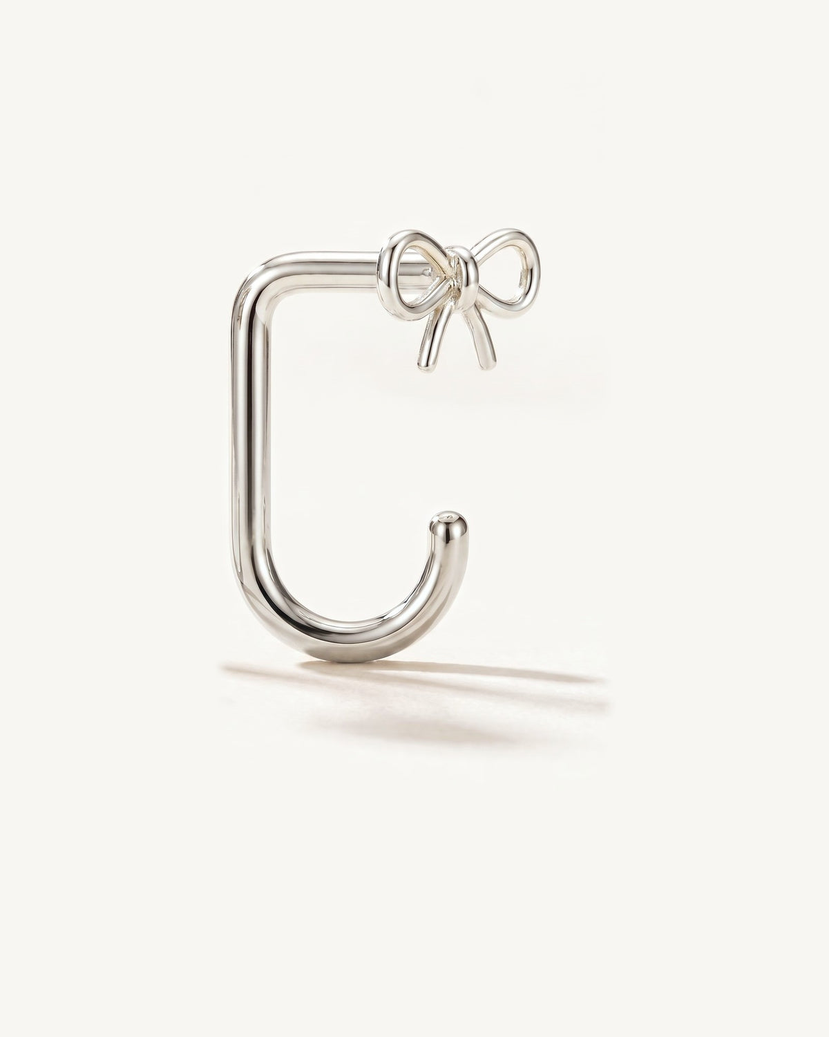 Bow Open Hoop, Sterling Silver, from the side, close up
