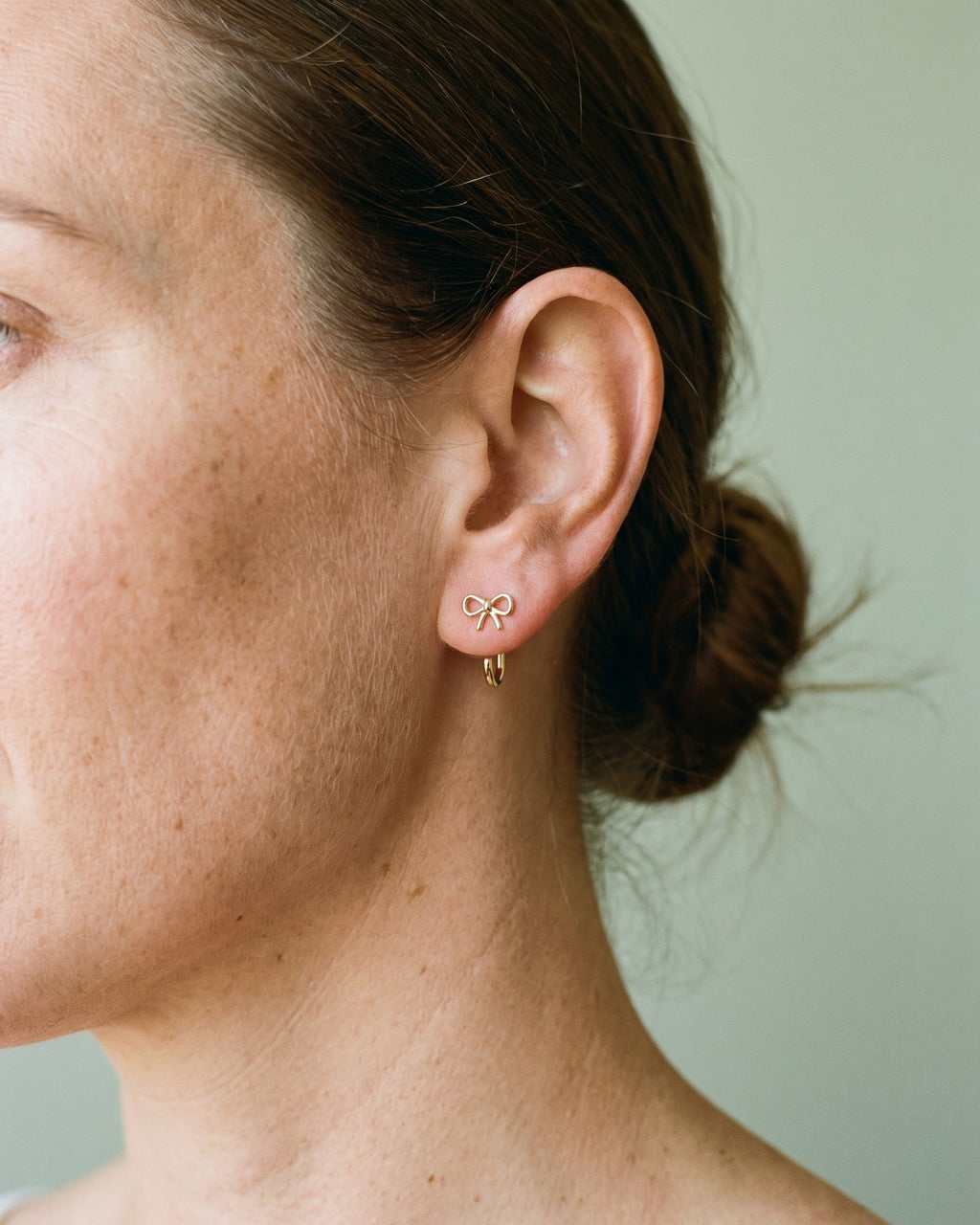 Bow Open Hoop in 18K Gold Vermeil, worn on the ear