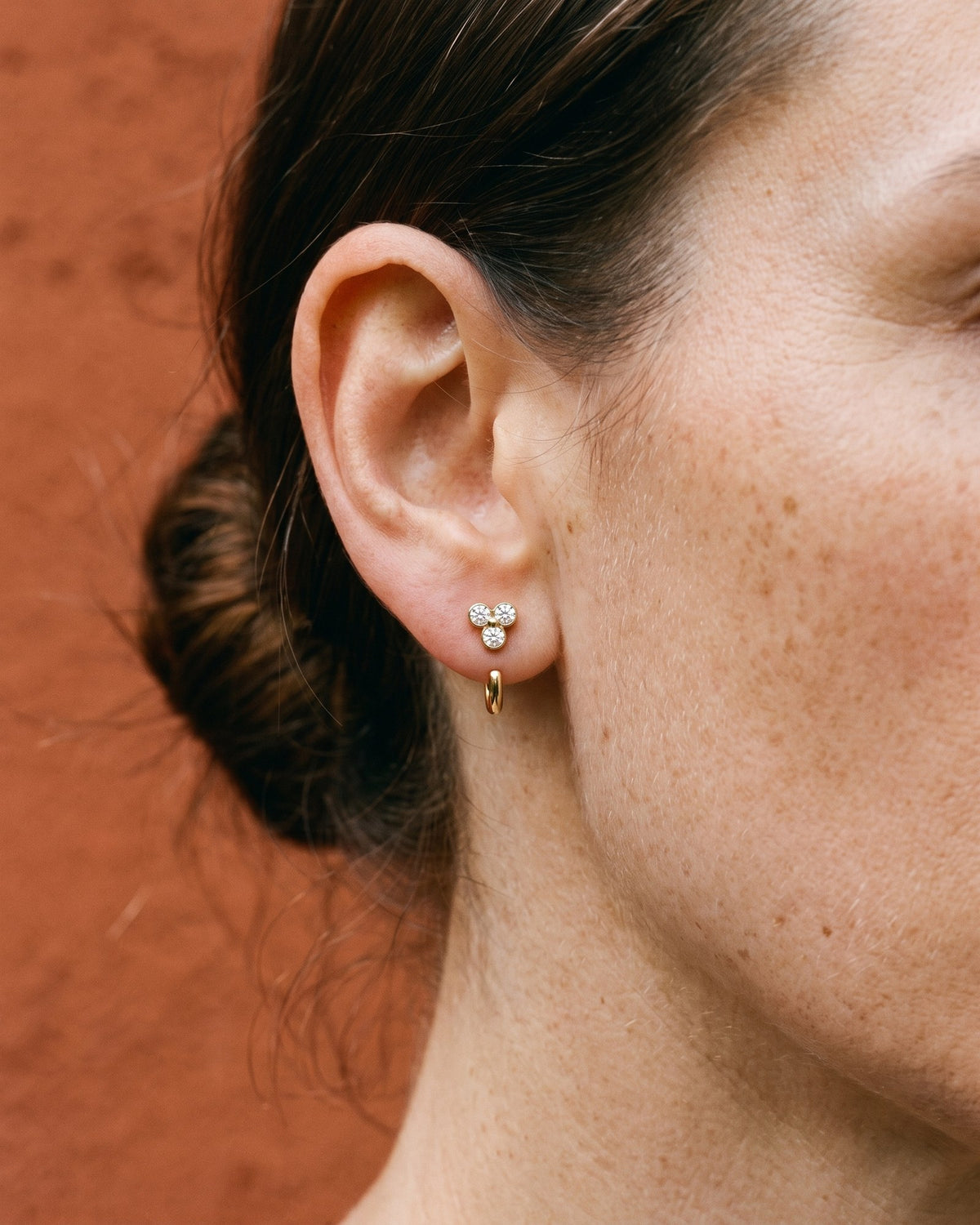 Clear Cluster Open Hoop in 18K Gold Vermeil, worn on the ear