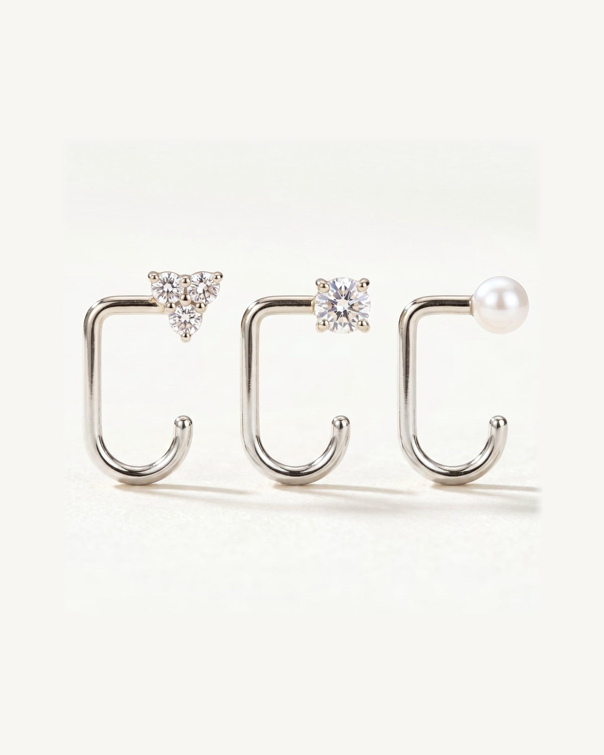 Clear Cluster, Round and White Bead, Sterling Silver, the three pieces side by side
