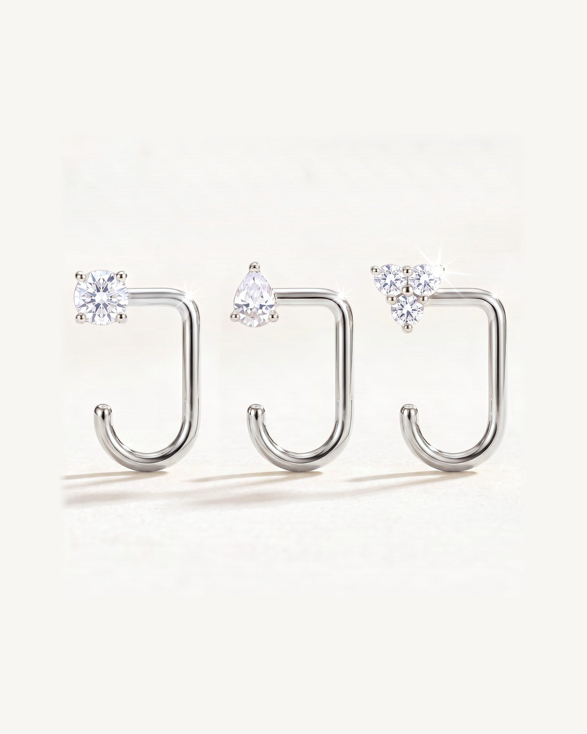 Clear Cluster, Teardrop and Round, Sterling Silver, the three pieces side by side