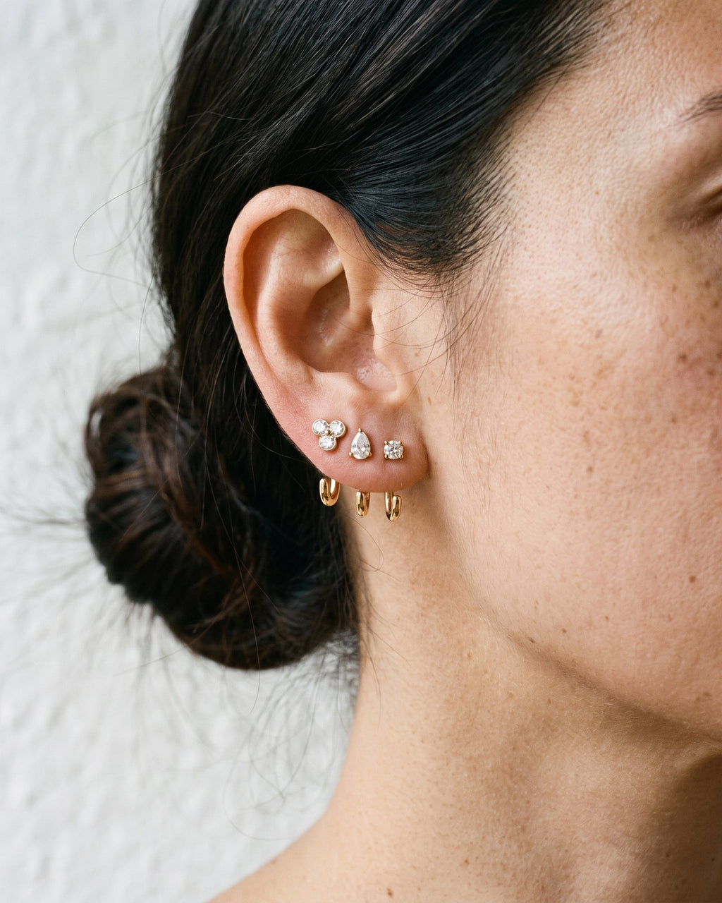 The Clear Cluster, Teardrop and Round set in 18K Gold Vermeil, worn on one ear