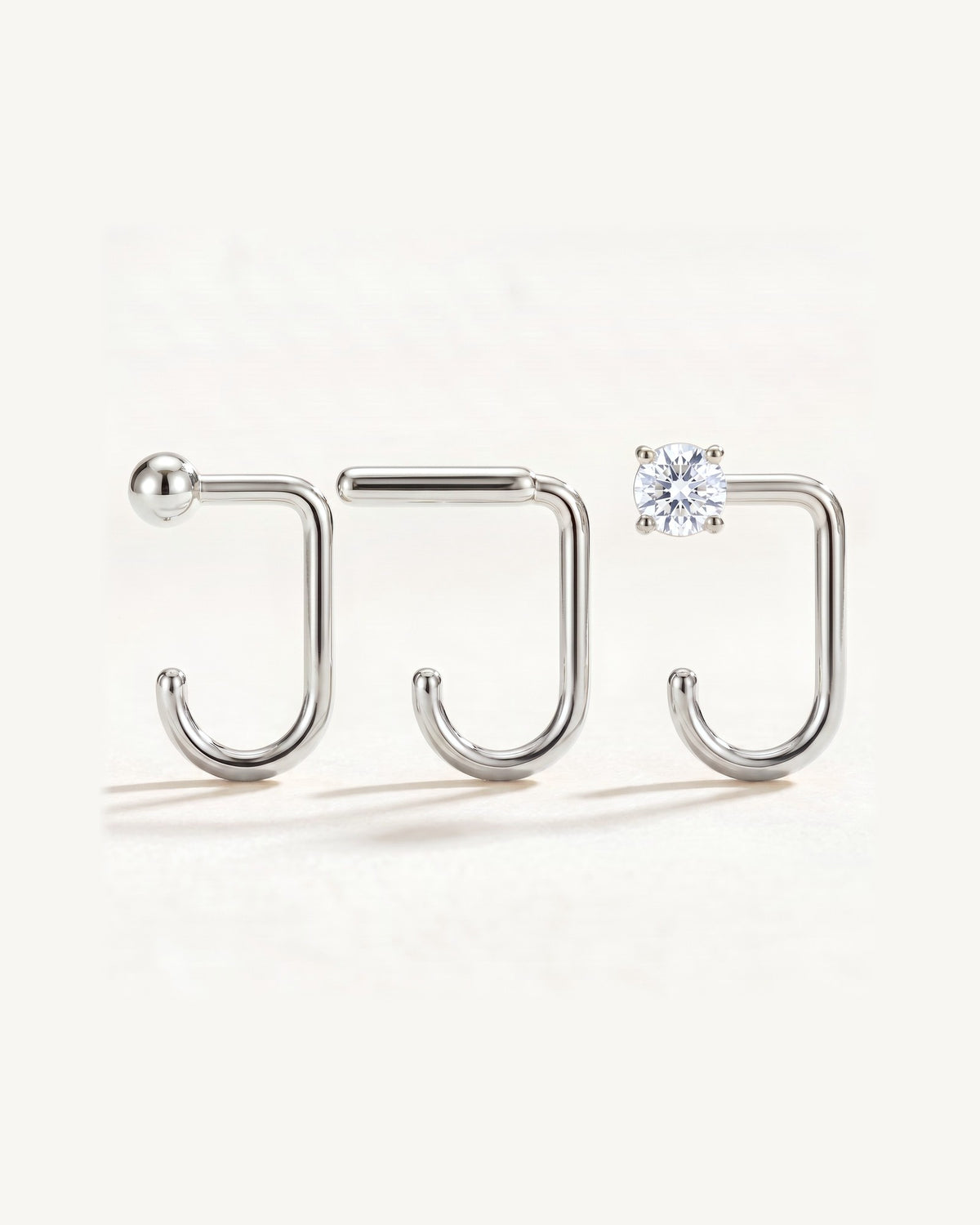 Clear Round, Bar and Ball, Sterling Silver, the three pieces side by side