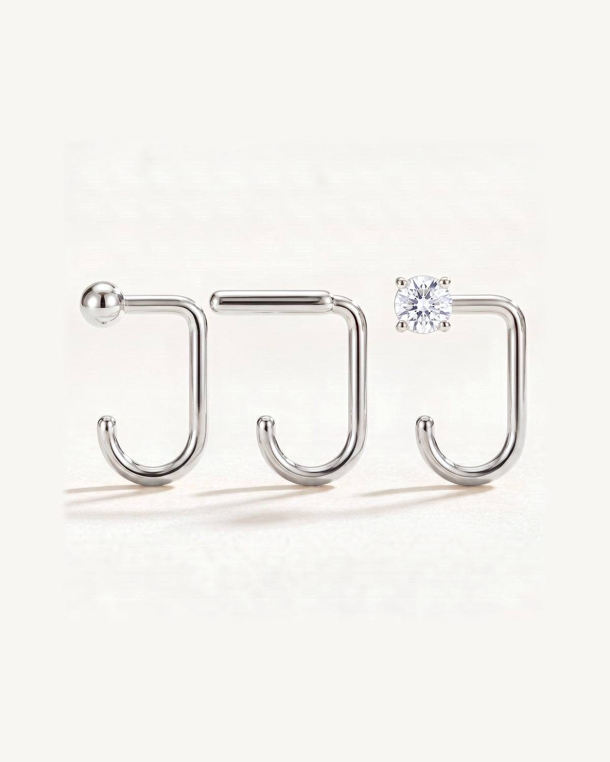 Clear Round, Bar and Ball, Sterling Silver, the three pieces side by side
