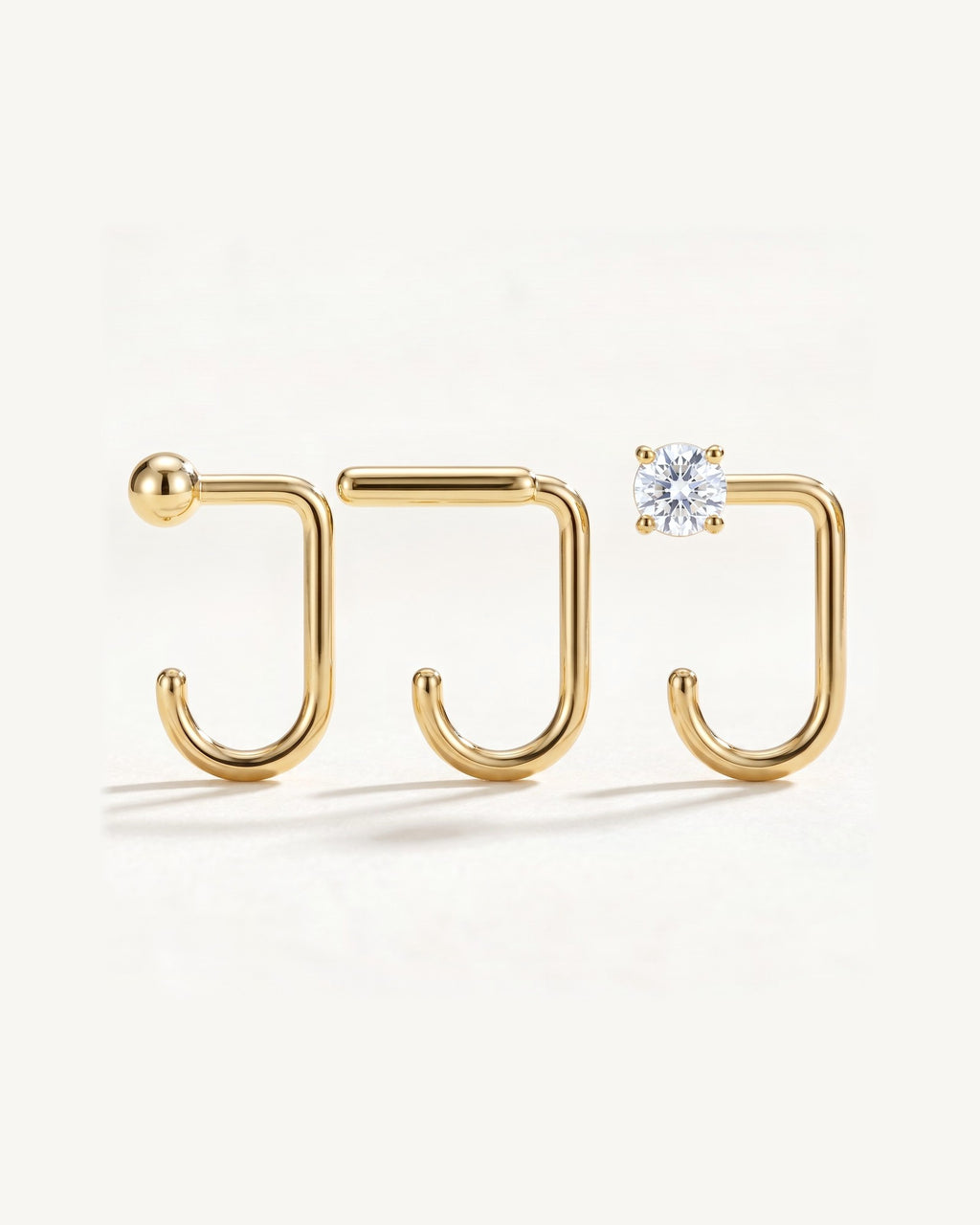 Clear Round, Bar and Ball, 18K Gold Vermeil, the three pieces side by side