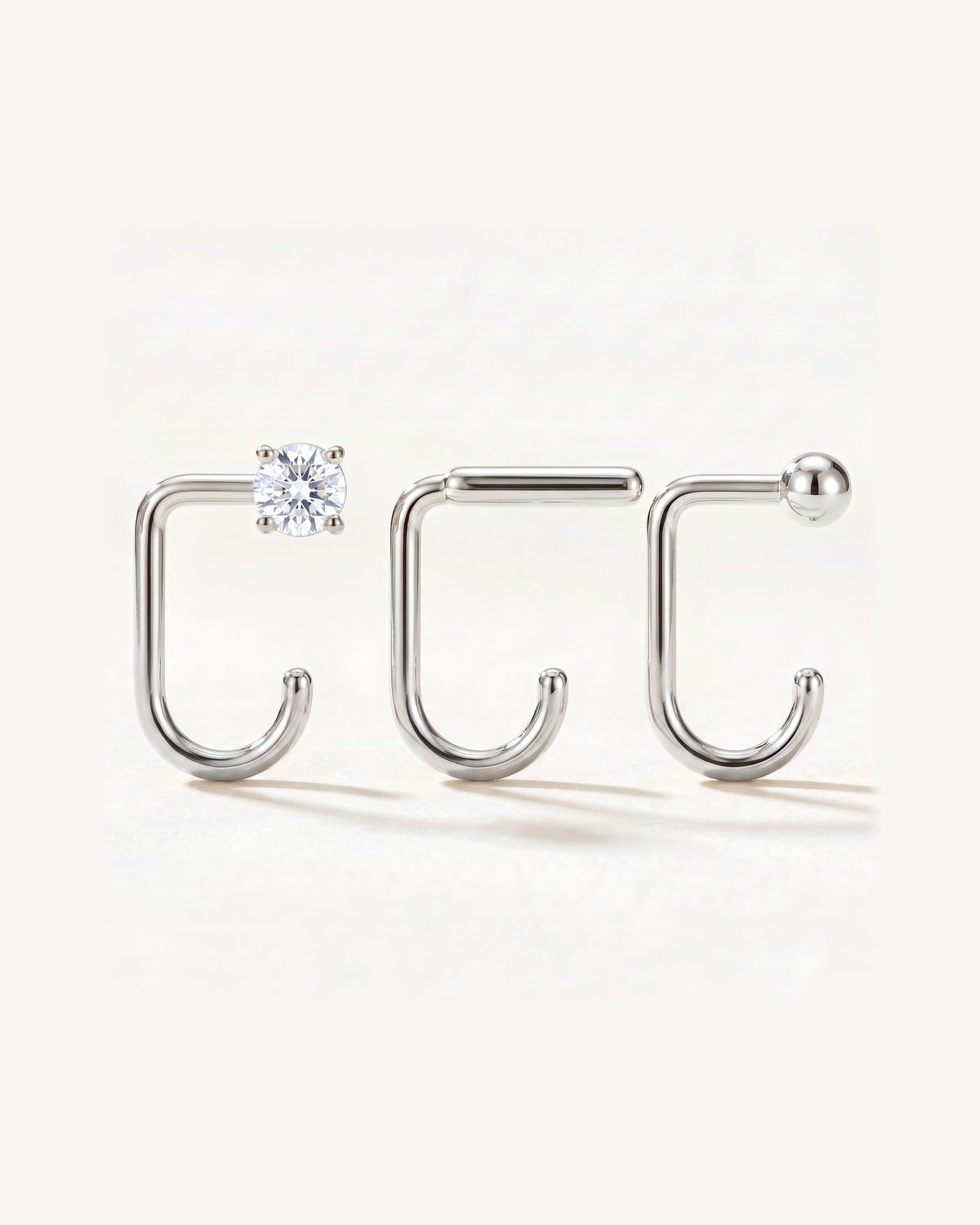 Clear Round, Bar and Ball, Sterling Silver, the three pieces side by side
