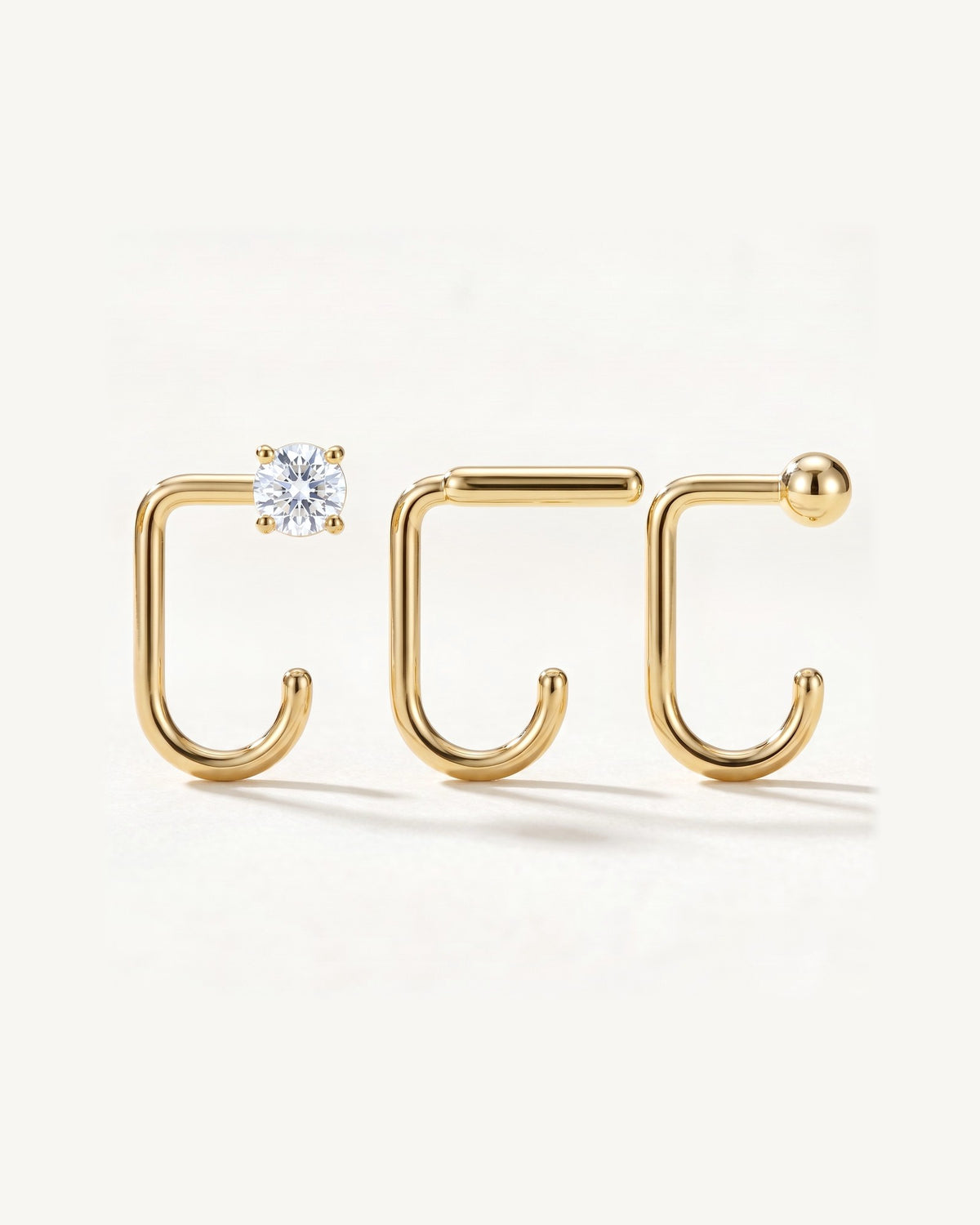 Clear Round, Bar and Ball, 18K Gold Vermeil, the three pieces side by side