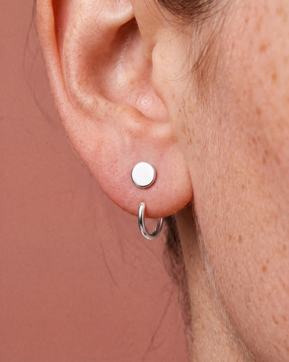 Disc Open Hoop in Sterling Silver, worn on the ear
