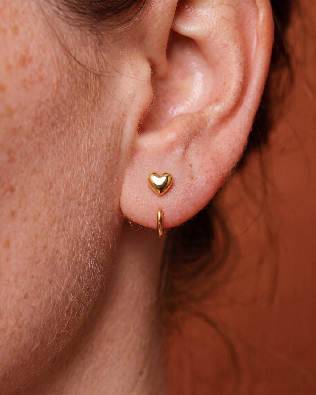 Puffy Heart Open Hoop in 18K Gold Vermeil, worn on the ear