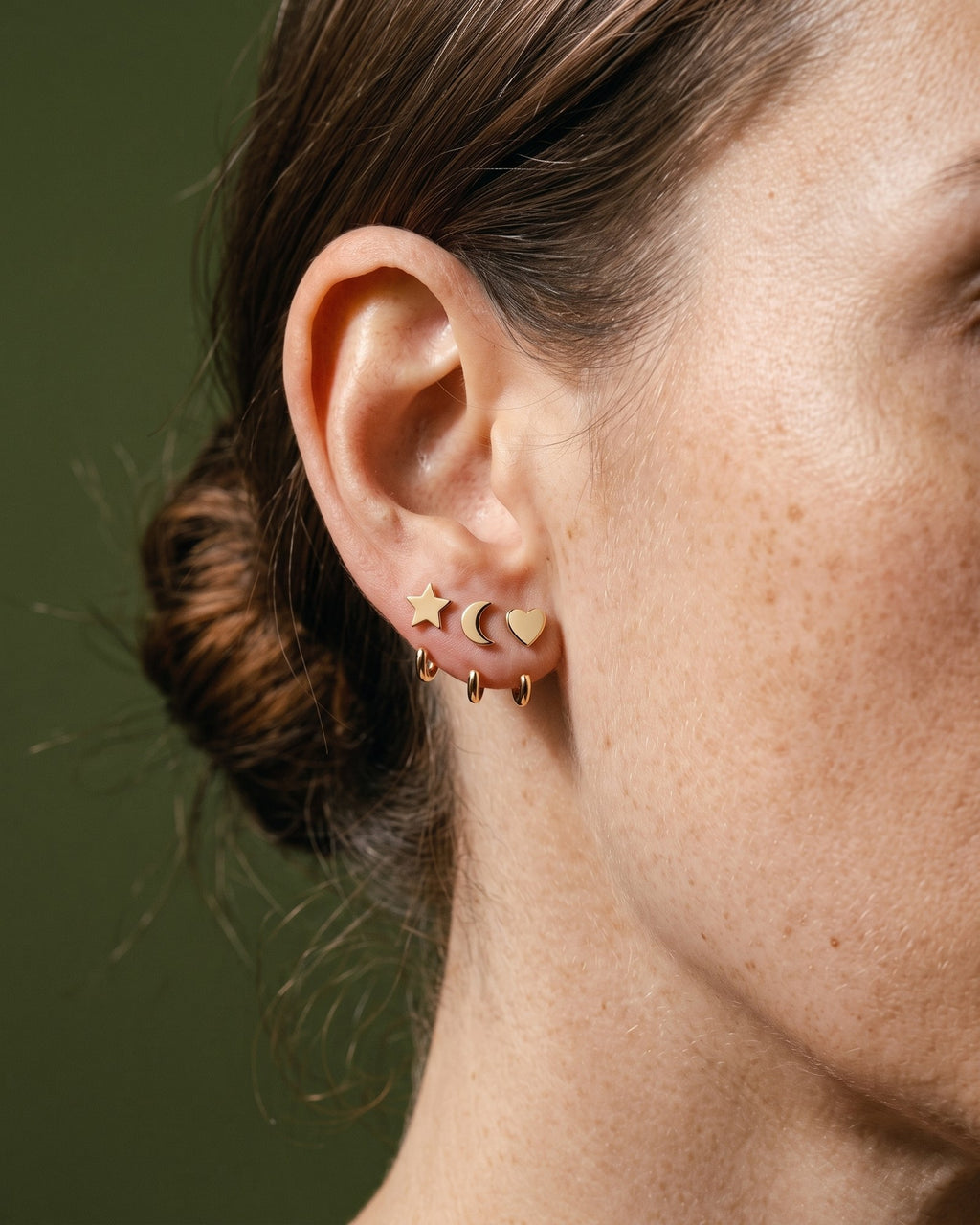 The Star, Crescent and Heart set in 18K Gold Vermeil, worn on one ear