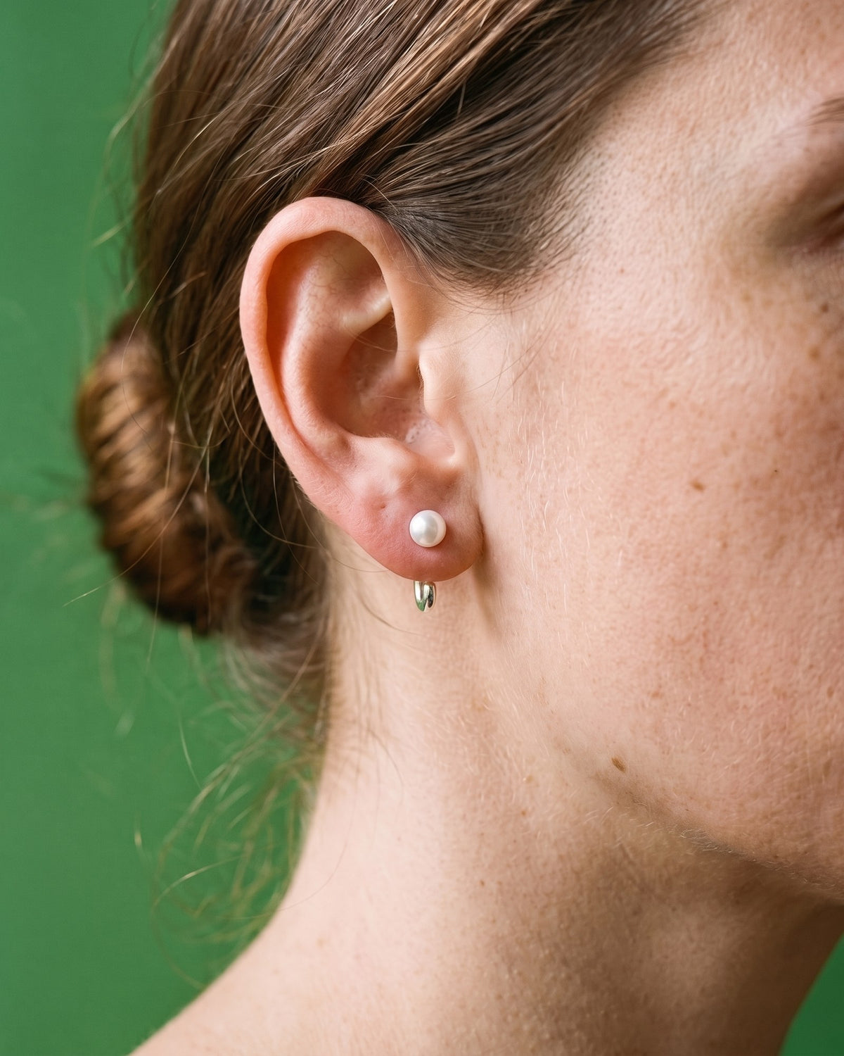 White Bead Open Hoop in Sterling Silver, worn on the ear